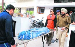 The police removes the body of Neha Goel from her parental house in Sector 32 on Tuesday. 