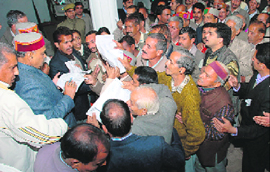 Chief Minister Prof Prem Kumar Dhumal listening to grievances of people at Tapovan in Dharamsala on Tuesday.