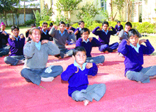 Mentally challenged students of Prayas doing yoga exercises in Jalandhar.