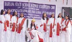 Children participate in Saraswati Vandna at the Haryana State School Science Exhibition