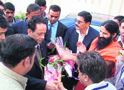 Anirudh Jagganath, President of the Republic of Mauritius, being welcomed by Baba Ramdev in Haridwar on Wednesday. 
