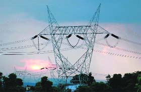Transmission lines of the Tehri hydro-electric project at Chidderwala village near Dehradun. Tribune photo: Anil P. Rawat
