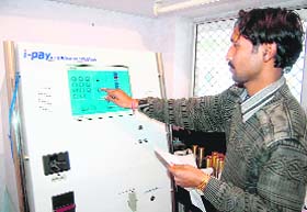 An anytime payment machine (APM) installed by the Uttarakhand Power Corporation for depositing bills at Dehradun. Tribune photo: Anil P. Rawat