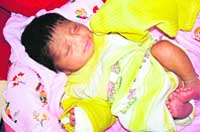Sweety, an abandoned baby, at the general hospital, Sirsa,