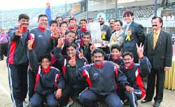 The victorious North Zone Team with the chief guest (zonal head, Noida), J.P. Sharma, at Guru Nanak Stadium in Ludhiana
