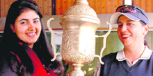 Former national amateur golf queen Irina Brar gives away Sardar Wazir Singh Memorial Trophy to Pauline J.M. Singh in Chandigarh on Thursday.