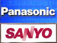 This combo shows photos of signboards of Japanese electronics giant Panasonic and Sanyo Electric at their offices in Tokyo. Panasonic Corp. said on Friday it had cleared the way to acquire struggling Sanyo Electric Co. for up to $9 billion, forming an industry heavyweight amid the global downturn.  AFP