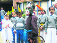 Students of Tribune Model School take part in a cultural programme.