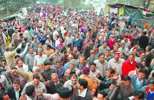 Government school teachers protest in Dehradun on Friday.
