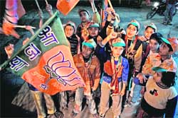 Children on a night campaign for the BJP in Jammu