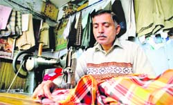 Tailor Ramesh Rahi who is also a Dogri poet. 