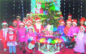 Students of Lovely Lotus School celebrate Christmas in Ludhiana on Friday. 