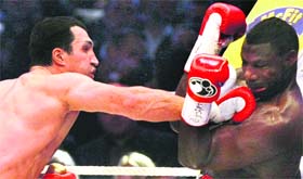 Wladimir Klitschko (left) retained his WBO, IBF and IBO world heavyweight titles after beating Hasim Rahman