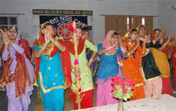 Students of Dasmesh Girls College of Education, Badal, presenting a cultural programme on the concluding day of NSS camp