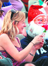 an English fan with the Santa Claus during the India-England Test match in Mohali on Saturday.