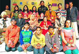 Mubarak Begum with winners of the Rafi Memorial Award-2008 at Tagore Theatre in Chandigarh on Saturday.