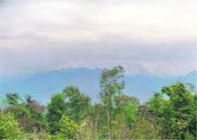 Rain lashed Dhauladhar ranges overlooking the Kangra valley