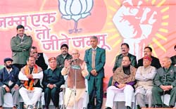 BJPs prime ministerial candidate L.K. Advani addresses an election rally at the Parade Ground in Jammu on Saturday.