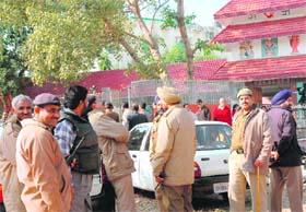 Policemen try to pacify two groups outside Ayyapa temple in Sector 47, Chandigarh