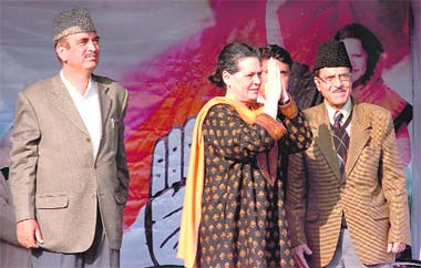 Sonia Gandhi greets the audience before addressing a rally at Dablehar (RS Pura) on Sunday