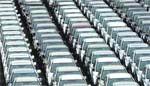 Japanese vehicles ready for shipment are parked at a port in Yokohama, south of Tokyo, on Monday. Japan's exports plunged at a record annual pace in November with shipments to Asia dropping the most since 1986 as a global economic slump and a surging yen slashed demand for everything from autos to electronics.  Reuters