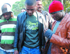 The three Nigerian nationals after being produced at the Patiala House Courts in New Delhi on Monday.
