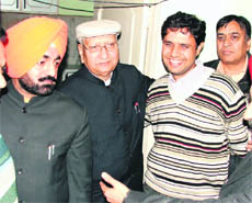 Deputy speaker Satpal Gosain with deputy commissioner Sumer Singh Gurjar at the formers residence in Ludhiana on Monday.