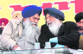 Chief Minister Parkash Singh Badal (right) along with Dr Rattan Singh Ajnala, SAD candidate for the Khadur Sahib constituency, during a rally at Amarkot village in Tarn Taran district