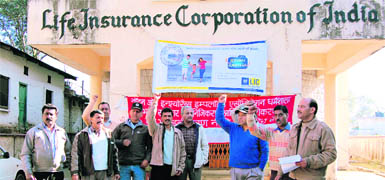  Members of the insurance employees association protest in support of their demands at Dharamsala on Tuesday.