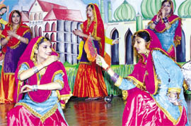 Students of Innocent Hearts School perform a Punjabi folk dance during the annual function in Jalandhar on Tuesday.