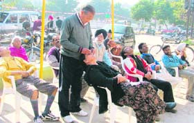 Eye drops being administered by Iqbal Singh in Ludhiana