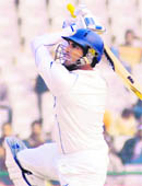 Yuvraj Singh clobbers a six in Mohali on Tuesday.