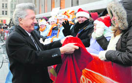Actor Dustin Hoffman collects toys in New York's Rockefeller Center for the 15th annual holiday toy drive of NBCs TV show "Today".