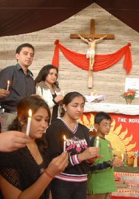People offering prayers on Christmas at the Holy Roasry Church in Bathinda on Thursday.