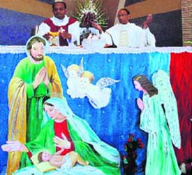 Father at a Church hold prayers during Christmas