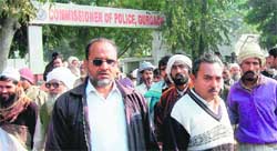 People outside the office of the Commissioner of Police, Gurgaon