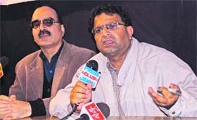 Panun Kashmir leaders Agnishekhar and Ajay Chrungoo (left) address mediapersons in Jammu