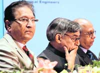 The Vice-Chancellor, Panjab University, R.C. Sobti, with Haryana Chief Secretary Dharam Vir and Union Minister of state Pawan Kumar Bansal at a conference in Chandigarh
