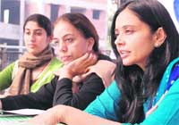 Vineeta Gupta from Global Fund for Children, Amrit Bolaria from Developing Indigenous Resources and Lovleen, a nutritionist, address mediapersons in Chandigarh