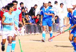 Players in action during the National Inter-University Hockey Championship in Haridwar 