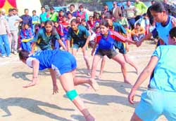 Girls jostle for points during the final match in Haridwar