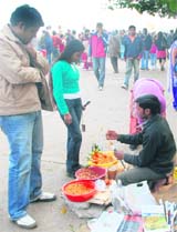 A squatter does his usual business at the Sukhna Lake on Sunday. 