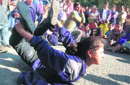 Yoga teachers stage a protest outside the Chief Ministers residence in Dehradun. 