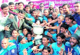 The victorious Gurukul Kangri university team with the general secretary of the Indian Olympic Association Randhir Singh in Haridwar on Sunday. 