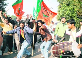 BJP supporters dance to the drumbeats after the partys exceptional poll performance in the Jammu region