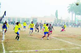 Players in action during the final of the 3rd Rajiv Sanjiv Football Tournament at Ahmedgarh on Sunday.