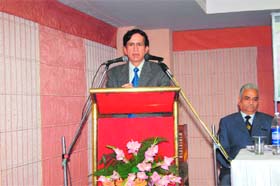 Labour commissioner N.C. Wadhwa at a workshop in Rewari.