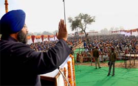 SAD (B) chief Sukhbir Badal addressing a public meeting in Bathinda district on Tuesday. 