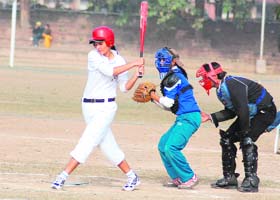 A baseball match in progress between Panjab University and Kurukshetra University during the All-India Inter-University Baseball (women) Championship in Chandigarh