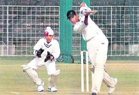 Players in action during a cricket match between Sector-16 Cricket Academy and St S Academy in Chandigarh